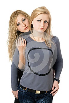 Portrait of two pretty young women. Isolated