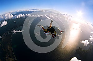 Portrait of two skydivers in action