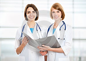 Portrait of two successful female doctors