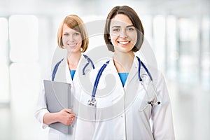 Portrait of two successful female doctors