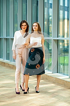 Portrait of two young business women