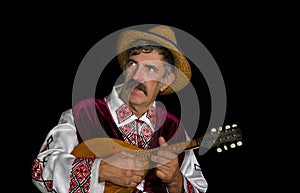 Portrait of Ukrainian country-man in traditional clothing