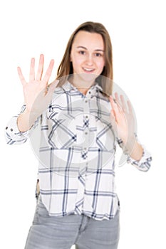 Portrait of uncertain sad upset disappointed confused woman demonstrating hand isolated on white