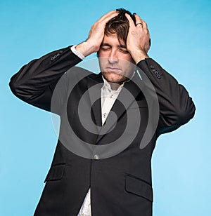 Portrait of unhappy businessman