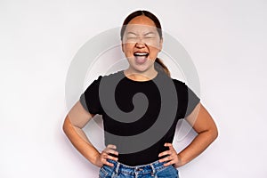 Portrait of unhappy young woman screaming