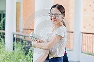 Portrait University Asian teen girl using tablet modern learning education lifestyle in school campus