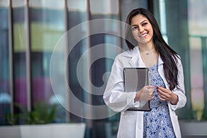 Portrait of a university med student, happy, smiling, cheerful, excited about a new career in the medical field