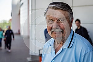 Portrait of an unshaven old man in thoughtfulness