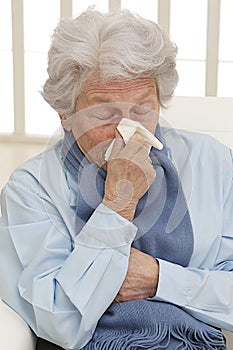 Portrait of an unwell senior woman