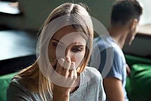 Portrait of upset offended frustrated woman with man