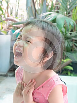 Portrait of upset stress sad unhappy asian crying little toddler girl in age of terrible two