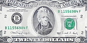 Portrait of US president Andrew Jackson on 20 dollars banknote closeup macro fragment