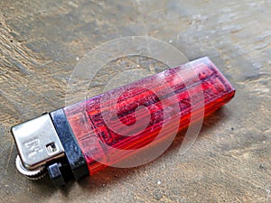 portrait of a used red lighter photo