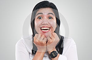 Portrait of Very Excited Young Asian Woman