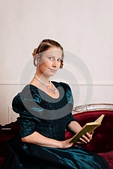 Portrait victorian woman reading book