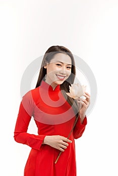 Portrait of Vietnamese girl traditional dress with lotus on white background