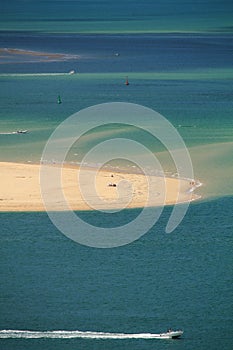 Portrait view on atlantic ocean with boats by the dune pyla