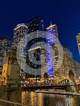 Portrait view of Chicago Loop illuminated at night with blue lights