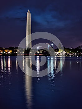 Portrait view of illuminated Washington Monument