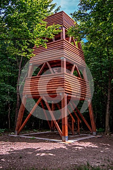 Portrait view of a wooden pyramid on the top