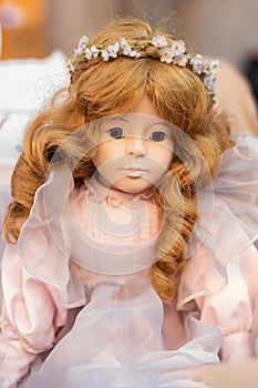 Portrait of a vintage doll at the flea market