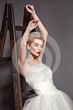 Portrait in vogue style of fashion beautiful bride in wedding dr