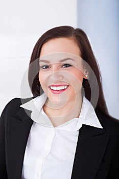 Portrait of welldressed young businesswoman