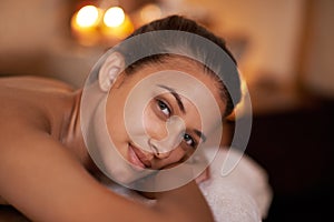 Portrait, wellness and woman in spa to relax for vitality or wellbeing, luxury and pamper for body care or treatment