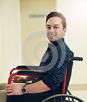 Portrait, wheelchair and man with smile, medical and confidence in hospital, checkup and physiotherapy. Healthcare