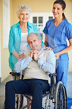 Portrait of wife, caregiver or old man in wheelchair in hospital clinic helping an elderly patient for support. Happy