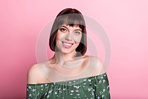 Portrait of winsome cheerful girl wearing off shoulders blouse isolated over pink pastel color background