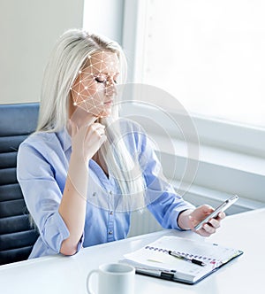 Portrait of attractive woman with a scnanning grid on her face. Face id, security, facial recognition, future technology