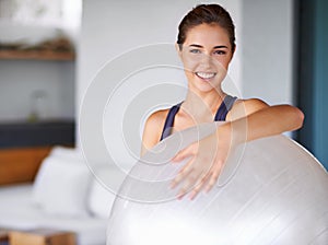 Portrait, woman and ball for pilates, fitness and yoga as sport, workout and training for energy. Personal trainer