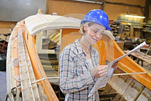 Portrait woman in boatyard