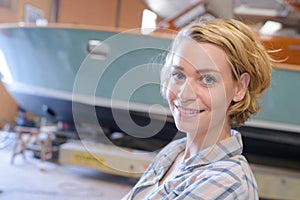 Portrait woman in boatyard