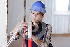 portrait woman builder at work