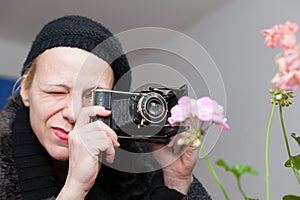Portrait of a woman with camera