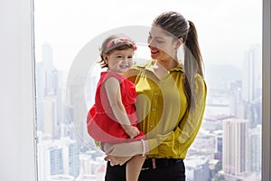 Portrait Woman In Career With Little Baby In Office