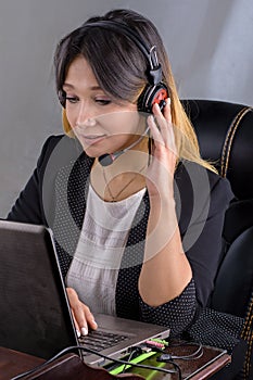 Portrait of woman customer service worker, call center smiling operator with phone headset