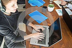 Portrait of woman customer service worker, call center smiling operator with phone on office