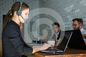 Portrait of woman customer service worker, call center smiling operator with phone on office