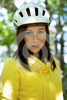 Portrait of woman in cycle helmet