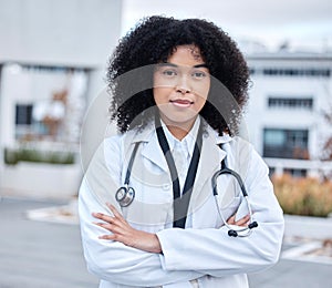 Portrait, woman and doctor with arms crossed, healthcare and success with career, outdoor and life insurance. Face