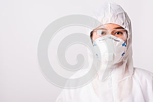 Portrait woman doctor or nurse in PPE uniform and gloves wearing face mask protective