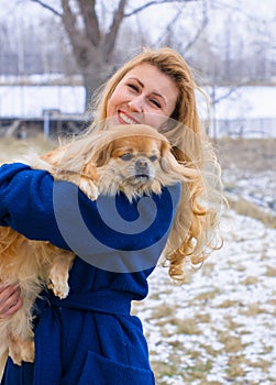 Portrait of woman with a dog, modern woman life