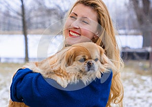 Portrait of woman with a dog, modern woman life