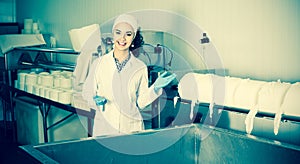 Portrait of woman dressed in lab coats is looking happy on the