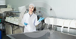 Portrait of woman dressed in lab coats is looking happy on the