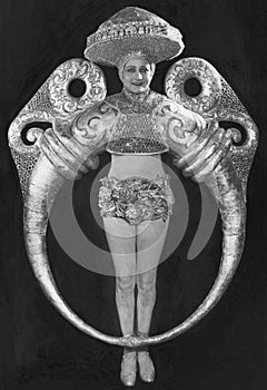 Portrait of woman in elaborate ring costume photo