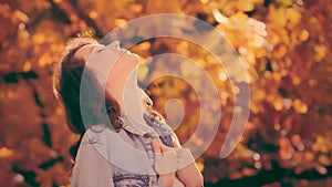 Portrait of woman enjoying autumn sun, autumn time